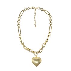 Add a charming touch to your outfit with our Encouraged Mini Bow Necklace! This dainty accessory features a mini bow and pearl, perfect for layering or wearing on its own. Cute and versatile, it's a must-have addition to any jewelry collection. Large Chain Heart Necklace 18k Gold Plated Over Brass 41 + 5 cm long Cubic Zirconium Detailing on Chain Extendable Lobster Clasp Chunky Metal Necklace With Heart Pendant, Chunky Metal Heart Pendant Necklace, Metal Heart Necklace With Chunky Chain, Valentine's Day Gold Chain Necklace With Heart Pendant, Valentine's Day Gold Heart Pendant Chain Necklace, Trendy Metal Heart Necklace With Chunky Chain, Valentine's Day Gold-tone Chain Necklace, Heart Pendant Chain Necklace In Gold Metal, Chunky Heart Pendant Metal Chain Necklace