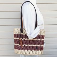 This raffia tote is a crochet straw bag with leather handles. The handmade raffia bag is great choice for every day in the summer, on the beach or on vacation. Its a great gift ideas. The beige and brown  summer tote bag have a faux leather bottom and handles. Clasp - magnetic button. Inside the bag is lining of high quality cotton. There are inside pockets, one of them with a zipper. Be unique. It`s a handmade bag, there is no two exactly the same bags in the world! DETAILS: - length 35cm/14 in Chic Jute Crochet Bag With Leather Handles, Chic Crochet Jute Bag With Leather Handles, Brown Straw Bag With Braided Handles For Beach, Chic Crochet Straw Bag With Leather Handles, Woven Leather Beach Bag For Everyday Use, Brown Woven Crochet Bag For Vacation, Casual Crochet Bag With Woven Leather In Natural Color, Casual Crochet Tote Bag With Woven Leather, Summer Brown Crochet Bag For Daily Use