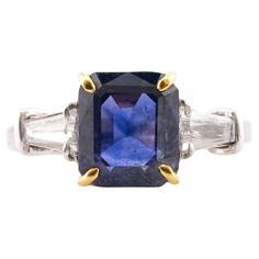 This exquisite piece is a testament to the timeless artistry of Antinori di Sanpietro. Crafted in Italy, the ring boasts a majestic sapphire, weighing 4.23 carats, at its center. The sapphire, a gem of arresting blue, is certified by the GRS, ensuring its authenticity and quality. According to the GRS report, the sapphire is unheated and untreated, making it a rare and authentic gemstone that radiates a natural, intense blue. Flanking the sapphire are two tapered baguette diamonds, meticulously Luxury Gia Certified Platinum Gemstones, Luxury Brilliant Cut Platinum Gemstones, Luxury Yellow Gold Gia-certified Sapphire Ring, Luxury Sapphire Gemstones With Vvs Clarity, Luxury Yellow Gold Sapphire Ring In Platinum, Luxury Platinum Sapphire Ring In Yellow Gold, Luxury Yellow Gold Sapphire Ring With Vvs Clarity, Luxury Sapphire Ring In Platinum With Vvs Clarity, Luxury Platinum Sapphire Ring