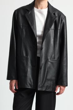 Make a statement with our Oversized Faux Leather Jacket, where edgy design meets refined luxury. This jacket is the ultimate fusion of contemporary style and effortless cool, offering a versatile piece that elevates any outfit. It features a double button front closure and front pockets. Modern Structured Outerwear With Button Closure, Sleek Leather Jacket With Concealed Placket For Office, Fall Leather Jacket With Concealed Placket For Work, Oversized Edgy Leather Jacket For Work, Modern Leather Jacket With Button Closure For Office, Modern Button-up Outerwear For Work, Modern Button-up Workwear Outerwear, Chic Leather Blazer With Snap Buttons, Chic Formal Leather Jacket With Snap Buttons