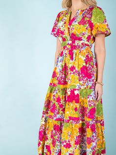 Indulge in the beauty and charm of summer with our Daffodil Garden Maxi Dress. Featuring a vibrant floral print, this dress is the perfect addition to your wardrobe. Made with lightweight material and a flowing design, it offers both style and comfort. Make a statement and brighten up any occasion with this must-have dress! Material: 50% Cotton, 50% Rayon Care: Machine wash cold. Tumble dry. Size. Fits true to size. Tropical Print V-neck Midi Dress For Garden Party, Vacation Ditsy Floral Print Maxi Floral Dress, Vacation Maxi Floral Dress With Ditsy Print, Vacation Floral Dress With Ditsy Print In Maxi Length, Floral Print Midi Sundress For Daywear, Multicolor Ditsy Floral Print Maxi Dress For Vacation, Spring Multicolor Floral Patchwork Maxi Dress, Multicolor Floral Patchwork Maxi Dress For Spring, Multicolor Floral Patchwork Dress For Garden Party