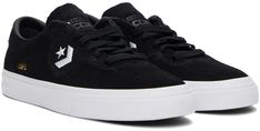 Low-top suede sneakers in black. · Lace-up closure · Padded tongue and collar · Embroidered logo graphic in white at sides · Text printed in gold-tone at sides · Treaded rubber sole in white Supplier color: Black/Black/White Low-top Skate Shoes With Logo Patch, High-top Skate Shoes With Embroidered Logo For Streetwear, High-top Skate Shoes With Logo Patch, Suede Sneakers With Embroidered Logo For Streetwear, Black High-top Custom Sneakers With Embroidered Logo, Sporty Converse Sneakers With Embroidered Logo, High-top Skate Shoes With Embroidered Logo For Sports, Sports Lace-up Skate Shoes With Embroidered Logo, Converse Sneakers With Embroidered Logo For Streetwear