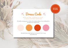 the dress code card is displayed next to some dried flowers and grasses on a white background