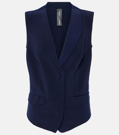 Single-breasted vest in blue - Norma Kamali | Mytheresa Fitted Sleeveless Vest With Pockets, Tailored V-neck Vest With Pockets, Tailored Sleeveless Vest Outerwear, Sleeveless Office Vest With Pockets, Sleeveless Vest With Pockets For Office, Workwear Vest With Pockets, Sleeveless Tailored Tops With Pockets, Tailored Workwear Vest With Pockets, Sleeveless Blazer With Pockets For Work