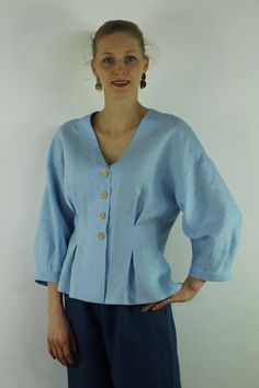 "Write the selected color in the message Handmade sky blue V neck linen blouse with front buttons and long sleeves, perfect for casual wear and suitable for any occasion in any season Details: - 100% natural linen produced in Europe ; - medium weight (180 gram per square meter); - color: sky blue, could be any from our colors catalog (color samples at the photo); Made to order, approximately a few days, If you have any questions please message me and I will be glad to answer. Size guide : Size X Light Blue Tops With Button Cuffs For Daywear, Spring Linen Tops With Buttons, Light Blue Summer Tops With Button Cuffs, Light Blue Long Sleeve Blouse With Buttons, Blue Linen V-neck Blouse, Light Blue Relaxed Fit Blouse With Buttons, Light Blue Blouse With Buttons And Relaxed Fit, Light Wash Linen Button-up Top, Light Blue Buttoned V-neck Blouse