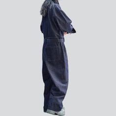 Introducing our ultra-baggy. street-trend women's denim overalls from the 2023 Autumn Collection ââ‚?for when you're feeling daring and edgy!Why They're Your Next Wardrobe EssentialThese denim overalls encapsulate the perfect combination of rebellious style and timeless sophistication. With a dark wash and distressed pattern. they feature a unique baggy fit and a sleek buttoned closure that adds an unexpected flair to your look.Key Highlights: Street Style Chic: Channel the spirit of the streets Casual Full-length Jumpsuits For Fall, Relaxed Fit Full Length Denim Jumpsuit, Blue Straight Leg Overalls For Streetwear, Relaxed Fit Full-length Denim Jumpsuit, Baggy Blue Straight Leg Overalls, Relaxed Fit Denim Jumpsuit With Wide Leg, Blue Baggy Straight Leg Overalls, Winter Cotton Jumpsuits And Rompers With Relaxed Fit, Trendy Denim Overall Pants