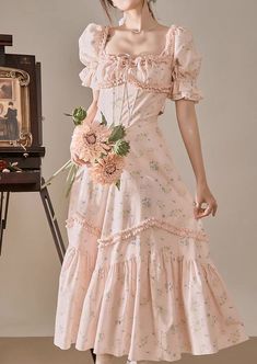 Feel like a princess in this sweet ditsy floral dress with a square neckline, short puff sleeves, ruffle details, basque waistline and mermaid flared midaxi skirt. Waist is enforced with fishbone boning and cinches with a self-tie waist strap. Concealed back zipper. S: 31.5" chest, 26" waist, 48" lengthM: 33" chest, 27.5" waist, 48" lengthL: 34.5" chest, 29" waist, 48" length Floral Dress Pink, Midaxi Skirt, Ditsy Floral Dress, Pink Floral Dress, Waist Strap, Shoe Gifts, Fish Bone, Overall Dress, A Princess