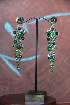 Emerald Green Dangle Earrings Rhinestone Pageant Earrings | Etsy Green Cubic Zirconia Crystal Earrings For Party, Green Cubic Zirconia Party Earrings, Green Crystal Earrings With Sparkling Stones For Party, Green Sparkling Jewelry For Party, Sparkling Green Jewelry For Party, Green Sparkling Stones Earrings For Party, Green Cubic Zirconia Bridal Earrings For Party, Crystal Rhinestone Jewelry For Prom, Glamorous Green Earrings With Sparkling Stones