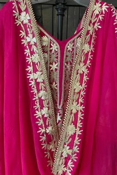 This beautifully designed Hot Pink Hand Embroidered Silk Anarkali Dress is crafted with intricate Tilla and Gotta work, creating a stunning choice for any special event. This dress includes a matching silk churidar bottom and a 2.5 meter pure chinon silk embroidered dupatta chunni, perfect for weddings and parties. Silk Chinon Silk Dupatta 2.5 meter Lined Hand Embroidered String tie back with zipper Churidar bottom Full elastic waist band Work: Handcrafted gotta work, tilla work Condition: New O Silk Anarkali Dress, Lucknowi Kurta, Silk Churidar, Patiala Salwar Suits, Silk Anarkali, Bridal Dupatta, Phulkari Dupatta, Gotta Work, Velvet Shawl