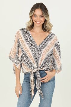 Introducing Ruqa's Rustic Striped Top: the perfect blend of boho and sophistication! Featuring a v-neck, tie waist, and kimono sleeves, this blouse is perfect for any occasion. Available in cream, black, and rustic taupe, with a unique vertical color stripe pattern. Elevate your wardrobe with this quirky and versatile top! Stretchy: No Stretchy Fit: Loose Fit **DELICATE WASH COLD*** Detailed Measurements: If you want to know the detailed measurements, you may send an email: contact@ivyshaven.com Patterned V-neck Tops For Vacation, Patterned V-neck Rayon Tops, Casual V-neck Top With Tie Sleeves, Flowy V-neck Kaftan For Day Out, Chic Printed V-neck Kaftan, Bohemian V-neck Top With Boho Print, Bohemian V-neck Kaftan For Brunch, Fall Bohemian V-neck Blouse, Bohemian Kaftan With Tie Waist And Kimono Sleeves