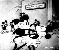 mickey mouse is dancing in front of other cartoon characters and an advertisement for some sweet home