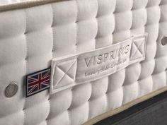 a close up view of a mattress with the name victoria on it