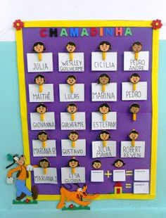 a bulletin board with the names of different children's names and pictures on it