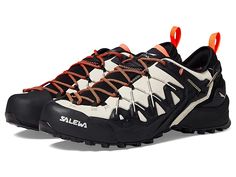 SALEWA Wildfire Edge GTX - Women's Shoes : Oatmeal/Black : With enhanced performance and a customized lacing system, the SALEWA Wildfire Edge GTX Climbing Shoes are perfect for your everyday hikes. Suede leather and microfiber upper. EVA with Ortholite footbed and midsole. Pull tab on the back for easy on and off. Waterproof and breathable membrane. Salewa's trademark 3F System connects the instep area of the boot with the sole and the heel. Round toe design. Pomoca Speed MTN Pro rubber outsole. Black Lace-up Climbing Sneakers, Breathable Leather Lace-up Trail Running Shoes, Gore-tex Trail Running Shoes With Rubber Sole, Gore-tex Trail Running Shoes With Rubber Sole And Lace-up, Dynamic Walking Shoes With Ortholite Insole For Outdoor, Trail Running Shoes With Vibram Sole For Hiking, Lace-up Trail Running Shoes With Vibram Sole For Hiking, Dynamic Lace-up Trail Running Shoes With Ortholite Insole, Black Round Toe Hiking Boots For Climbing