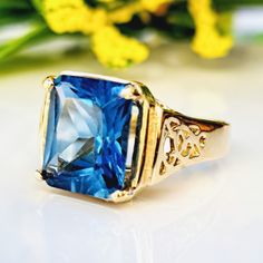 6.20 Carat Natural London Blue Topaz 14k Solid Gold Ring Ring Material: 14k Solid Gold Total Metal Weight: 5.9 Grams Gemstone: Natural London Blue Topaz Gemstone Color: Dark Blue Gemstone Shape: Cushion Gemstone Dimensions: 12.00x10.00 mm Gemstone Quantity: 1 Gemstone Carat Weight: 6.20 Carat Ring Quantity: One Ring Condition: New Delivered in an elegant gift box Made in the USA 💜 Please do not hesitate to ask any questions and we will be happy to assist You 💜 Morganite Jewelry, November Birthstone Ring, Peach Morganite, Morganite Diamond, Gold Cocktail Ring, Gold Cocktail, November Birthstone, Green Sapphire, Unisex Ring