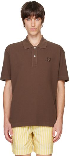 Cotton piqué polo. · Rib-knit spread collar · Two-button placket · Embroidered logo patch at chest · Vented side seams · Dropped shoulders Supplier color: Firewood Collared Polo Shirt With Embroidered Logo For Work, Collared Polo Shirt With Embroidered Logo, Classic Brown Polo Shirt With Collared Neckline, Classic Brown Polo Shirt, Brown Cotton Polo Shirt With Polo Collar, Brown Cotton Polo Shirt, Fox Head, Floral Shoes, Mens Scarves