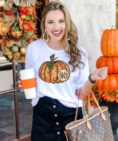 This monogrammed pumpkin tee is too cute and perfect for any occasion this Fall! Perfect for matching family tees! Our personalized graphic tees are so cute and make great personalized gifts! They are perfect for birthdays, family vacations, sporting events, holidays, and so much more! Everyone loves an adorable monogrammed tee at a fantastic price!  break:specs  GILDAN Short Sleeve - 6.0 oz. pre-shrunk 100% cotton Long Sleeve - 6.0 oz. pre-shrunk 100% cotton V-Neck - 4.5 oz. pre-shrunk 100% rin Personalized Cotton T-shirt For Fall, Cute Fall T-shirt For Gift, White T-shirt For Fall Family Matching, Casual Personalized T-shirt For Fall, Personalized Casual T-shirt For Fall, Fall Crew Neck Birthday T-shirt, Crew Neck Birthday T-shirt For Fall, White T-shirt As A Fall Gift, White T-shirt For Fall Season Gift