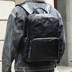 Whether you're on your way to the office, participating in business meetings, or setting off for a weekend getaway, this leather backpack serves as the ideal companion for the modern man on the move. Its versatile design seamlessly transitions between professional settings and casual outings, ensuring that you make a stylish statement wherever you go. The leather construction not only adds a touch of sophistication but also guarantees durability for your on-the-go lifestyle. Equipped with ample storage space, it accommodates your work essentials during weekdays and seamlessly transitions to a reliable travel companion for your weekend escapades. The thoughtfully crafted details and modern aesthetic make it a go-to accessory, effortlessly blending functionality with a refined sense of style Large Capacity Leather Business Backpack, Classic Leather Backpack For Business With Large Capacity, Modern Soft Leather Backpack For School, Modern Soft Leather School Backpack, Casual Business Backpack In Soft Leather, Leather Backpack For Business Trips With Luggage Sleeve, Leather Backpack With Luggage Sleeve For Business Trips, Modern Business Backpack With Leather Backing, Leather Laptop Bag With Luggage Sleeve For Commuting