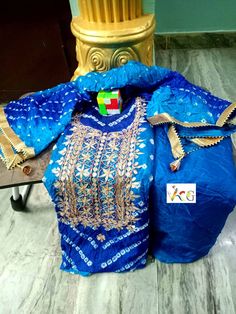 Thank you very much for visiting my shop. New Launched heavy suits pcs Bandhej silk suits with heavy hand goota Patti nd Kundan work with gotta bijjya border on duppta with same fabric silk bottom  Note: Duppta also with gotta Patti work 03 pcs suits Kurta 2.5 mitrs Duppta 2.5 mitrs Bottom 2.5 mitrs Easy to wear and very comfortable                                                    FREE STITCHING OFFER It Gracefully Add Style To Your Attire & Match With Your Confidence Disclaimer: Colors may slightly vary due to Photographic effects IMPORTANT NOTE : Please Be aware that Similar Looking Products of LOW QUALITY are Being Sold at Lower Price By Other Sellers, So Make Sure that You Order Genuine Products Sold By "VINTAGECRAFTGALLERY" Traditional Dola Silk Unstitched Suit With Gota Work, Navratri Unstitched Silk Suit With Gota Work, Festival Chanderi Unstitched Suit With Gota Work, Navratri Gota Work Unstitched Raw Silk Suit, Semi-stitched Raw Silk Set With Gota Work, Silk Bandhani Print Straight Kurta, Silk Unstitched Suit With Gota Work For Navratri, Designer Banarasi Silk Salwar Kameez With Gota Work, Designer Multicolor Unstitched Suit With Gota Work