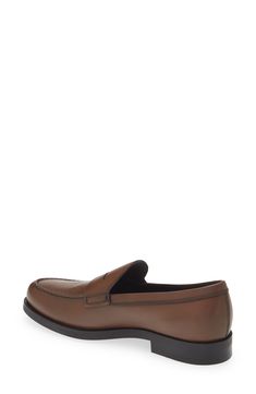 A classic keeper strap and exposed hand-stitching add a refined touch to a sharp Italian loafer crafted in semiglossy calfskin leather with a pebbled sole. Leather upper and lining/rubber sole Made in Italy Designer Shoes Timeless Leather Tassel Loafers, Brown Calf Leather Moccasins With Moc Toe, Brown Moc Toe Calf Leather Moccasins, Timeless Brown Leather Moccasins, Brown Bridle Leather Loafers For Work, Classic Monk Strap Shoes With Leather Lining For Derby, Classic Brown Monk Strap Shoes With Rubber Sole, Classic Slip-on Calf Leather Shoes, Classic Leather-lined Monk Strap Shoes For Derby