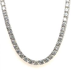 Stunning Modern 18k White Gold Natural 11.29 Carat Round Brilliant Diamond Tennis Necklace, approximately 2.7mm diameter, G-H in color and VS-SI1 in clarity.  The piece is set with 140 diamonds and is 16.5" inches in length and weighs 20 grams. Classic White Gold Tennis Necklace With Lab Grown Diamonds, Classic White Gold Tennis Necklace With Lab-grown Diamonds, White Gold Tennis Necklace With Diamond Cut Lab-grown Diamonds, Fine Jewelry Tennis Necklace With Brilliant Cut Cubic Zirconia, Fine Jewelry Cubic Zirconia Tennis Necklace With Brilliant Cut, Fine Jewelry Tennis Necklace With Diamond Cut Cubic Zirconia, Fine Jewelry Tennis Necklace In Diamond White Cubic Zirconia, Diamond White Cubic Zirconia Tennis Necklace, Luxury Lab Grown Diamond Tennis Necklace For Formal Events