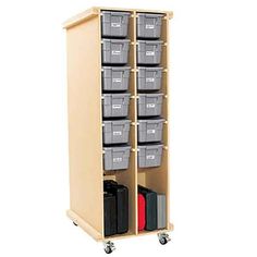 a large storage cabinet with many bins on wheels