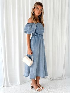 Indulge in luxurious fashion with our Patricia Off The Shoulder Denim Dress. Its off-the-shoulder design adds a touch of elegance, while the denim material exudes timeless sophistication. Perfect for any occasion, this dress will elevate your style and leave a lasting impression. Size Guide: Model is 5’6” tall, and has a 32.6” bust, 25.2” waist, & 34.7” hips. She is wearing a S / US 4 / AU 8. This dress is true to size. Material: 55% Denim Cotton. 45% Polyester. Feature: Strapless neckline. Off Fitted Off-shoulder Denim Dress, Casual Dark Wash Strapless Dress, Casual Strapless Denim Dress For Summer, Spring Medium Wash Strapless Dress, Medium Wash Strapless Summer Dress, Elegant Short Sleeve Denim Dress, Spring Denim Off-shoulder Dress, Off-shoulder Denim Dress For Spring, Off-shoulder Cotton Midi Dress For Spring