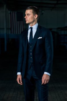 Color: Navy Dapper Fitted Suit For Business Casual, Dapper Fitted Business Casual Suits, Dapper Fitted Suits For Workwear, Dapper Fitted Workwear Suits, Fitted Dapper Blazer For Workwear, Dapper Fitted Three-piece Suit For Work, Fitted Dapper Three-piece Suit For Work, Tailored Double Breasted Suit For Work, Tailored Dapper Double Breasted Suit For Workwear