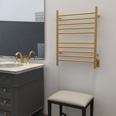 a bathroom with a sink, towel rack and stool next to the vanity in front of it