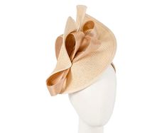 Large nude twisted plate decorated with silk abaca bow. Hand made in Melbourne by our skillful milliners, this headpiece will be a crown jewel of your spring racing outfit.   Made in Australia  Exclusive materials  Stylish design by Fillies Collection  Comfortable headband Elegant Adjustable Ribbon Headband, Elegant Adjustable Mini Hat With Bow, Elegant Adjustable Headpieces With Ribbon, Elegant Spring Hair Accessories With Decorative Bow, Beige Headpiece For Kentucky Derby Event, Elegant Spring Event Headband, Elegant Fitted Fascinator With Ribbon, Elegant Beige Summer Hair Accessories, Elegant Beige Hair Accessories For Summer