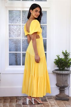 Length from shoulder to hem of size S: 131cm. Chest: 35cm, Waist: 29cm, size S. Maxi dress. Semi-lined. Model is a standard XS and is wearing size XS. True to size. Non-stretch. Puff sleeves. Flowy skirt. Cutout. Elastic back. Cold hand wash only. Zipper. Polyester/Rayon. Be seen and admired for your style. The Daytime Dance Maxi Dress features puff sleeves and a gorgeous flowy skirt. Style with heels for a fancy brunch. Fancy Brunch, Skirt Style, Dress Yellow, Flowy Skirt, Yellow Dress, Bridesmaid Dress, Puff Sleeves, Puff Sleeve, Outfit Ideas