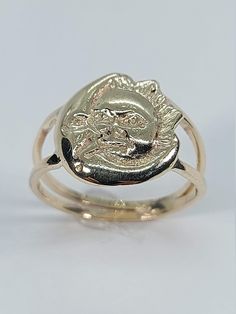 This stunning Sun/Moon ring has been carefully crafted in warm 10k yellow gold. This ring will make a great any occasion gift/birthday/Christmas gift. This delicate ring will not go unnoticed. All of my jewelry is handmade from scratch one item at a time. A tracking shipping number will be provided to you once the ring has been mailed.  Ring Measurements and Materials: Ring is size 7 1/2 but can be resized at no extra cost and will be shipped to you in an elegant gift box. Ring Weight: 3.5 grams 14k Yellow Gold Moon Phase Rings, 14k Yellow Gold Rings With Moon Phase, 14k Yellow Gold Rings With Moon Phase Detail, Moon Shaped 14k Yellow Gold Rings, 14k Gold Moon Shaped Promise Ring, Symbolic Gold Rings With Sun And Moon Design, 14k Gold Rings With Moon Phase For Gift, Gold Moon Shaped 14k Gold Ring, Moon Shaped 14k Gold Ring