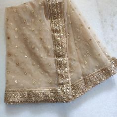 Golden Indian Dupatta party wear | Long net embroidered scarf | Punjabi dress dupattas with zari embroidery for lehenga | Dupatta This Dupatta is sequin embroidered on net with beautiful golden border. This can be your wedding dress chunni for Indian occasion wear for festival. This has perfect bling for you to look classy and ethnic at same time. This can even be your home decoration fabric for you can even wear them with lehenga. This can be made in any color. We can even make a jacket or ponc Cheap Chanderi Dupatta For Festivals, Luxury Net Dupatta With Traditional Drape, Luxury Ceremonial Dupatta With Dori Work, Luxury Nida Dupatta With Zari Work, Luxury Chinon Dupatta In Traditional Drape, Luxury Gold Chikankari Embroidery Dupatta, Luxury Dabka Dupatta For Spring, Luxury Yellow Dupatta With Resham Embroidery, Cheap Georgette Dupatta