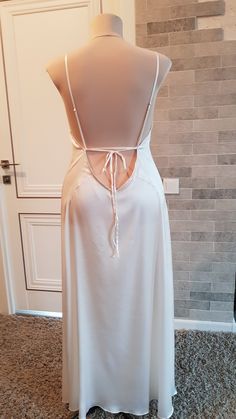 Pure natural silk or artificial silk/satin wedding camisole to add a perfect touch to your perfect and unique day. Only high quality fabrics and high finishing used for making the robe as neat as it can be. For more wedding robes, please access https://www.etsy.com/shop/LidiasBoutiqueDesign?ref=seller-platform-mcnav&section_id=25023222. For more wedding dresses, please access https://www.etsy.com/shop/LidiasBoutiqueDesign?ref=seller-platform-mcnav§ion_id=23157290. For more wedding tops and b Wedding Tops, Slip Dress Silk, Wedding Robes, Veil Styles, Satin Camisole, Silk Nightgown, Wedding Skirt, Bridal Robe, Wedding Robe