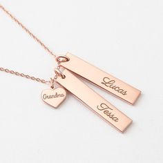 "This beautiful grandma necklace is engraved with your children's names on each charm. It's a perfect gift for your loved one with up to 5 personalized charms. PRODUCT INFO * Material: Solid 925 Sterling Silver * Dimensions: Bar charm measures ~ 1 1/4\" x 1/4\" (32 x 6.5mm). Heart charm measures ~3/8\"x5/16\" (9.5 x 8.2mm) * Word limits: 1 name/charm * By default, silver charm comes with BLACK engraving and gold-plated charm comes with CLEAR engraving HOW TO ORDER * Select your preferred finishi Mother's Day Engraved Nameplate Charm Necklace, Heart Pendant Charm Necklace For Birthday And Mother's Day, Personalized Rose Gold Birthstone Charm Necklace, Rose Gold Nameplate Necklace For Birthday, Customizable Rose Gold Necklaces For Birthday, Mother's Day Adjustable Nameplate Charm Necklace, Mother's Day Charm Necklace With Name On Heart Pendant, Mother's Day Heart Pendant Charm Necklace With Name, Adjustable Nameplate Charm Necklace For Mother's Day