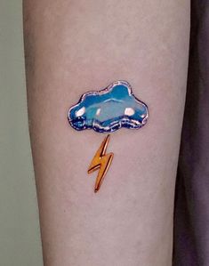 a person with a lightning sticker on their arm