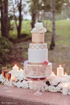 the wedding cake is decorated with pink flowers and lace, along with other items from the bride's collection