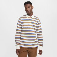 This polo is made with ultrasoft cotton fabric with vibrant contrasting stripes. Designed to feel relaxed through the body and sleeves for an athletic fit you can layer. Spring Cotton Polo Shirt With Contrast Stripes, Sporty Striped Polo Shirt With Ribbed Collar, Casual Cotton Polo Shirt With Striped Cuffs, Casual Striped Polo Shirt, Casual Striped Long Sleeve Polo Shirt, Casual Long Sleeve Striped Polo Shirt, White Polo Shirt With Contrast Stripes For Spring, Sporty Striped Cotton Polo Shirt, Casual Long Sleeve Polo Shirt With Striped Collar