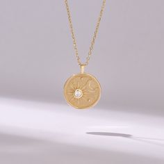 Elevate your style with our Unique Moon Necklace, meticulously crafted from 14k solid yellow gold. This handmade necklace exudes modern elegance and timeless sophistication. Perfect for everyday wear, it adds a touch of trendy flair to any ensemble, making it a must-have accessory for the modern woman.  𝐈𝐭𝐞𝐦 𝐃𝐞𝐭𝐚𝐢𝐥𝐬 * Gold KT: 14KT * Custom Gold Color:  Yellow Gold * Charm 17.35x14.70 mm * Charm Thickness: 1.05 mm 𝐆𝐞𝐦𝐬𝐭𝐨𝐧𝐞 𝐃𝐞𝐭𝐚𝐢𝐥𝐬 * Natural Diamond * Diamond Color-Clari Celestial Engraved Jewelry For Anniversary, Celestial 14k Gold Round Pendant Jewelry, Celestial Medallion Jewelry For Anniversary, Yellow Gold Diamond Necklace With Clavicle Chain, Diamond White Engraved Pendant Necklace, Engraved Diamond White Pendant Necklace, Celestial Engraved Necklaces For Anniversary, Timeless Yellow Gold Necklaces With Birthstone, Celestial Yellow Gold Jewelry With Round Cut