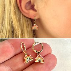 Cute mini gold rainbow hoop huggie earrings for children!  These colorful rainbow 18k gold plated small hoop earrings make the perfect gift for your little girl.  Hinge closure for easy on/off.   D E T A I L S: -Children's colorful mini rainbow hoop huggie earrings -14mm size -Stainless Steel, 18k gold plated -Trendy, minimalist design -Perfect for any occasion! V I E W - O U R - O T H E R - K I D S - J E W E L R Y: https://www.etsy.com/shop/JewelryVV?section_id=22076012 See all of our designs: Baby Earrings, Girl Rainbow, Earrings Cute, Huggie Earrings, Birthday Gifts For Kids, Jewelry Earrings Hoops, Huggies Earrings, Toddler Girl, Valentine Day Gifts