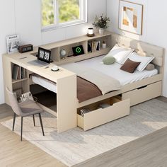 a bed with drawers underneath it and a desk under the bed in front of it