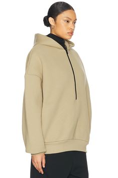 Self: 69% cotton 31% polyester, Pocket Lining: 100% cotton.  Made in Portugal.  Machine wash.  Partial front zipper closure.  Attached hood.  Side seam pockets.  Attached hood.  Fleece lining.  .  .  .  .  .  .  .  . Half Zip Hoodie, Half Zip, Zip Hoodie, Front Zipper, Portugal, Zipper