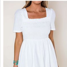 Just Received Today And Did Not Like It On Me And Don’t Want Store Credit. Brand New With Tags And Absolutely Adorable! White Smocked Top With Short Sleeves For Summer, Casual Smocked Dress With Square Neck And Smocked Back, Casual Smocked Dress With Square Neck For Daywear, Casual Smocked Dress With Square Neck, White Smocked Top With Elastic Neckline, White Smocked Ruched Top With Square Neck, White Smocked Square Neck Top With Ruched Detail, White Casual Smocked Top With Elastic Neckline, Fitted Smocked Dress With Gathered Neckline For Vacation