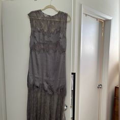 Anthropologie Brand Sleeveless Dress In Size Medium. Grey Satin With Lace. New With Tags. Elegant Sheer Sleeveless Lace Dress, Sheer Sleeveless Lace Evening Dress, Sleeveless Fitted Lace Casual Dress, Sleeveless Sheer Lace Midi Dress, Sheer Lace Sleeveless Midi Dress, Sleeveless Evening Maxi Dress With Lace Trim, Sleeveless Lace Trim Maxi Dress For Evening, Sleeveless Lace Maxi Evening Dress, Chic Sleeveless Sheer Lace Dress