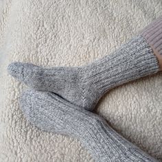 These are highest quality Italian alpaca (35%) and lamb wool (65%) winter socks. Made in Italy. These nordic socks do not contain latex, elastomer, nylon or any other kind of synthetic materials.  We also re-enforced toes and heels with extra-durable organic cotton filament. Our wool comes from mulesing - free farms and has organic certification. These warm socks are extremely comfortable and snug. Can be used as bed socks. Many of our clients have shared that they use them as boot socks and tre Comfortable Thick Snug Socks, Comfortable Thick Socks For Stocking Stuffers, Comfortable Knitted Gray Socks, Thick Comfortable Cozy Socks, Cozy Soft Gray Socks, Cozy Thick Comfortable Socks, Cozy Comfortable Thick Socks, Cozy Knitted Snug Socks, Comfortable Knitted Winter Socks