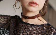 Introducing our captivating "Minimalist Leather Choker" - a stylish and versatile accessory that exudes timeless charm. Handcrafted with meticulous attention to detail, this choker is designed to elevate your style and add a touch of sophistication to any outfit. Made from premium quality Italian leather, this choker boasts durability and comfort, ensuring it remains a cherished piece for years to come. This "Minimalist Leather Choker" features a sleek and minimalistic design, making it suitable for various occasions. Whether you're dressing up for a special event or adding a chic flair to your everyday ensemble, this choker effortlessly blends with your wardrobe, making it a must-have accessory. Adjustable to your desired length, this choker ensures a perfect fit, and the secure fastening Trendy Brown Choker Jewelry, Classic Adjustable Choker For Formal Occasions, Classic Formal Adjustable Choker, Modern Leather Choker Jewelry, Chic Handmade Choker As Gift, Chic Handmade Choker For Gift, Chic Handmade Adjustable Choker, Brown Adjustable Choker, Trendy Adjustable Choker For Formal Occasions