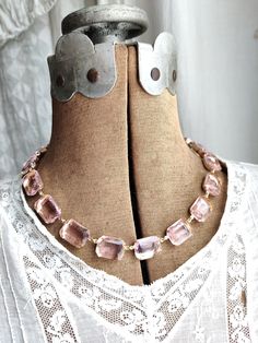 "Beautiful palest pink octagon crystals are like a ring of blushing roses around your neck. Each glass stone hand set and hand linked with high quality findings. Guaranteed to last a lifetime. Adjustable from 16 to 18\" with lobster claw and a 2\" extender. Each stone is 18 by 13mm, the perfect size to be seen and make a statement, but not too over the top big. Please see all of the photos for size reference. Beautiful for layering with my other pieces! Gift boxed and sent Priority mail. Need to Adjustable Pink Jeweled Jewelry, Elegant Pink Crystal Necklace For Party, Elegant Adjustable Rose Quartz Crystal Necklace, Pink Rose Quartz Jewelry For Party, Octagon Necklace For Wedding, Elegant Rose Quartz For Jewelry Making, Feminine Rose Quartz Wedding Jewelry, Pink Rose Quartz Party Jewelry, Elegant Rose Gold Jewelry With Faceted Beads