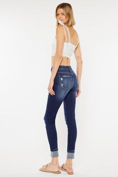 Our Chelsea High Rise Jeans come in a super skinny fit with whiskering, light distress, and a gently faded wash. Sits slightly above the natural waistline as it tapers down the leg and finishes with a folded hem creating a casual design that's perfect for on-the-go days. Made with buttery-soft stretch denim that's flexible and breathable. Features a classic five-pocket design and four-button front closure. 9.5" Rise / 28.5" Inseam 54% Cotton, 34% Rayon, 10% Polyester, 2% Spandex Model in size 25 Dark Wash Style # : KC6192D Stretchiness Level >> Stretch SIZE WAIST HIP 0 / 23 23.5" 30.5" 1 / 24 24.5" 31.5" 3 / 25 25.5" 32.5" 5 / 26 26.5" 33.5" 7 / 27 27.5" 34.5" 9 / 28 29" 36" 11 / 29 30.5" 37.5" 13 / 30 32" 39" 15 / 31 33.5" 40.5" Everyday Distressed Mid-rise Bottoms, High Rise Distressed Bottoms For Everyday, Distressed Mid-rise Bottoms For Everyday, Mid-rise Distressed Bottoms For Everyday, Everyday High Rise Distressed Bottoms, Everyday Mid-rise Distressed Bottoms, Distressed Stretch Bottoms For Everyday, Everyday Stretch Distressed Bottoms, Stretch Distressed Bottoms For Everyday