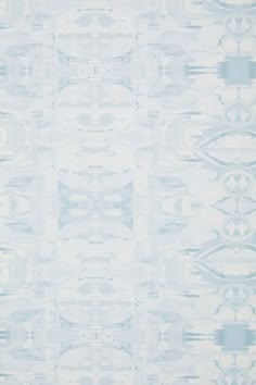 a blue and white wallpaper with an abstract design