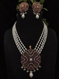 Gorgeous Long CZ Stones Necklace with Pearl in Victorian style with matching earrings Necklace length: 22 inches approx  Highest quality and craftsmanship Free shipping Since natural semiprecious beads are used in this necklace, Color and shape of the beads may vary slightly Please let me know if you have any questions Luxury Bollywood Ceremonial Pearl Necklace, Luxury Beaded Necklaces Temple Jewelry, Luxury Silver Kundan Temple Necklace, Luxury Temple Jewelry Beaded Necklace With Pearl Chain, Luxury Pearl Bollywood Necklace, Luxury Temple Jewelry Style Pearl Pendant Necklace, Elegant Luxury Temple Necklace With Pearl Chain, Luxury Silver Temple Jewelry Necklace, Luxury Temple Jewelry Pearl Necklace